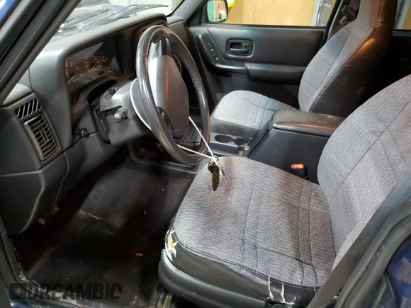 2000 Jeep Cherokee z VIN 1J4FF48S0YL153259, wystawiony jako Copart lot #52509955 z przebiegiem 204 042 mil mil oraz Czysty tytuł • Clean title. Historia ofert i sprzedaży dostępna na DreamBid. Obrazek 7.