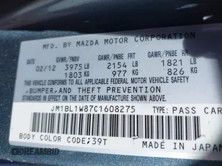 2012 Mazda 3 i Grand Touring with VIN JM1BL1W87C1608275, listed as a IAAI auction lot 41598227 with 85,816 mi miles and . Bid and sale history available at DreamBid. Image 9.