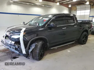 2018 Honda Ridgeline RTL-E z VIN 5FPYK3F74JB011175, wystawiony jako Copart lot #80824144 z przebiegiem Nie podano mil oraz Szkoda całkowita • Salvage title. Historia ofert i sprzedaży dostępna na DreamBid. Obrazek 1.