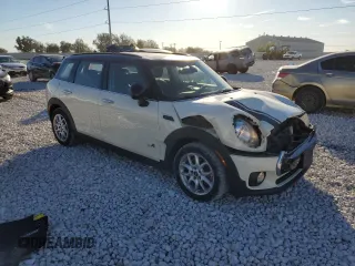 2017 MINI Clubman Cooper with VIN WMWLU1C52H2F27147, listed as a Copart auction lot 81914474 with 90,807 mi miles and Clean Title. Bid and sale history available at carsss.com. Image 4.