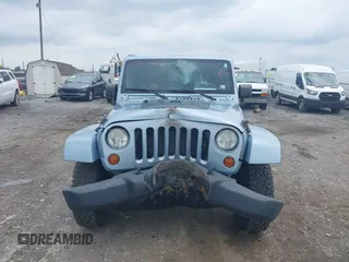 2012 Jeep Wrangler Arctic with VIN 1C4AJWBG7CL148325, listed as a IAAI auction lot 39943602 with 86,625 mi miles and . Bid and sale history available at DreamBid. Image 12.