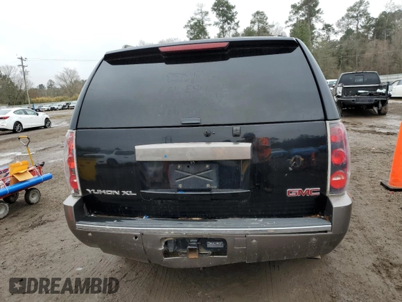2014 GMC Yukon Denali z VIN 1GKS1EEF7ER222591, wystawiony jako Copart lot #42623745 z przebiegiem 211 992 mil mil oraz Szkoda całkowita • Salvage title. Historia ofert i sprzedaży dostępna na DreamBid. Obrazek 6.