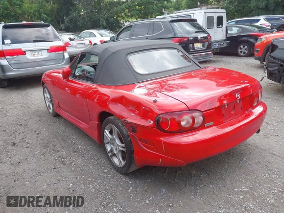 2004 Mazda MX-5 Miata LS with VIN JM1NB353440401450, listed as a IAAI auction lot 42542318 with 106,950 mi miles and . Bid and sale history available at DreamBid. Image 3.