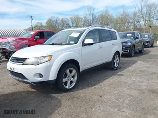 2008 Mitsubishi Outlander XLS with VIN JA4MT41X18Z006404, listed as a IAAI auction lot 42107656 with 131,571 mi miles. Bid and sale history available at carsss.com. Image 2.
