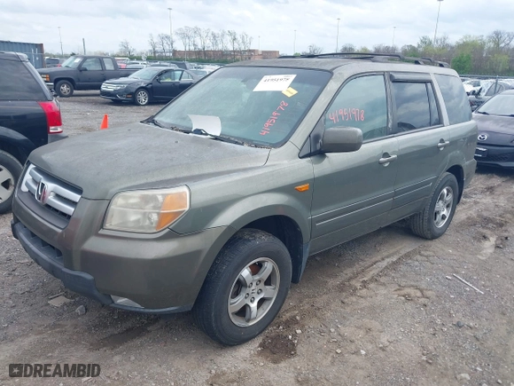 2007 Honda Pilot EX-L with VIN 5FNYF28617B039309, listed as a IAAI auction lot 41951978 with 239,583 mi miles. Bid and sale history available at carsss.com. Image 2.