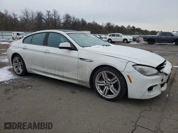 2015 BMW 6 Series 640i xDrive z VIN WBA6B8C55FD452972, wystawiony jako Copart lot #44559495 z przebiegiem 114 358 mil mil oraz Szkoda całkowita • Salvage title. Historia ofert i sprzedaży dostępna na DreamBid. Obrazek 4.