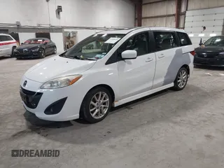 2012 Mazda 5 Grand Touring with VIN JM1CW2DL9C0100114, listed as a IAAI auction lot 42038998 with 160,651 mi miles and . Bid and sale history available at DreamBid. Image 2.