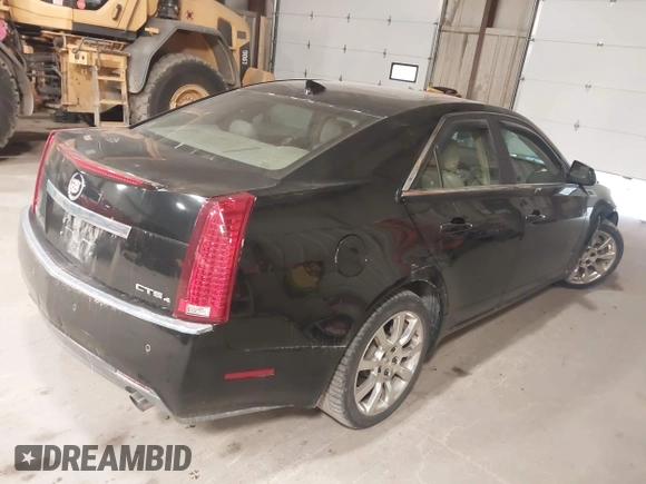 2009 Cadillac CTS AWD w/1SB with VIN 1G6DT57V290152885, listed as a IAAI auction lot 42063192 with 146,119 mi miles. Bid and sale history available at carsss.com. Image 4.
