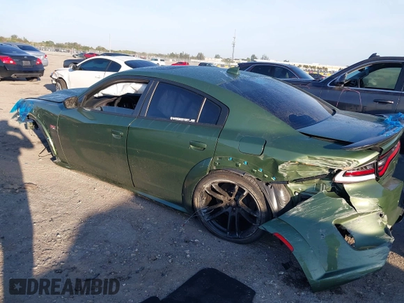 2023 Dodge Charger Scat Pack Widebody with VIN 2C3CDXGJXPH655916, listed as a IAAI auction lot 41439932 with 16,128 mi miles and . Bid and sale history available at carsss.com. Image 3.