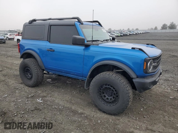 2023 Ford Bronco with VIN 1FMDE5AHXPLB26651, listed as a Copart auction lot 77497964 with 19,700 mi miles and Salvage Title. Bid and sale history available at carsss.com. Image 4.