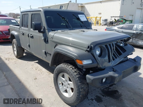 2020 Jeep Gladiator Sport S z VIN 1C6HJTAG7LL154664, wystawiony jako IAAI lot #42033131 z przebiegiem 73 282 mil mil oraz . Historia ofert i sprzedaży dostępna na DreamBid. Obrazek 1.