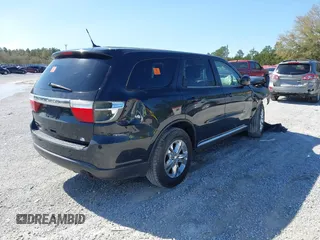 2013 Dodge Durango SXT with VIN 1C4RDJAG2DC617983, listed as a IAAI auction lot 41805992 with 210,560 mi miles and . Bid and sale history available at carsss.com. Image 4.