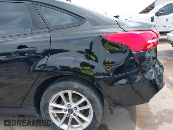 2018 Ford Focus SE with VIN 1FADP3F22JL311975, listed as a IAAI auction lot 41934856 with 68,974 mi miles. Bid and sale history available at carsss.com. Image 20.