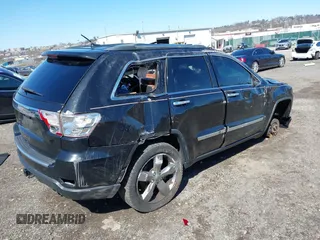 2013 Jeep Grand Cherokee Overland with VIN 1C4RJFCT2DC536899, listed as a IAAI auction lot 41853217 with 1 mi miles. Bid and sale history available at carsss.com. Image 4.