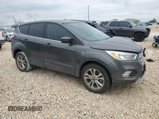 2017 Ford Escape SE with VIN 1FMCU0G98HUE35046, listed as a Copart auction lot 50996105 with 60,765 mi miles and Salvage Title. Bid and sale history available at DreamBid. Image 4.