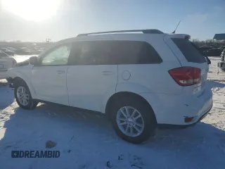 2014 Dodge Journey SXT with VIN 3C4PDCBGXET149847, listed as a Copart auction lot 45884035 with 131,121 mi miles and Salvage Title. Bid and sale history available at carsss.com. Image 2.