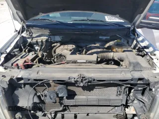 2014 Ford F-150 XL with VIN 1FTMF1CM4EKD33317, listed as a Copart auction lot 50059765 with 188,709 mi miles and Salvage title. Bid and sale history available at DreamBid. Image 12.