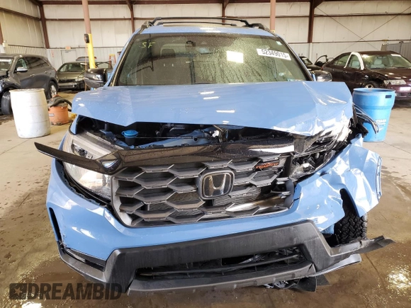 2024 Honda Passport TrailSport z VIN 5FNYF8H61RB013217, wystawiony jako Copart lot #52349015 z przebiegiem 8 360 mil mil oraz Szkoda całkowita • Salvage title. Historia ofert i sprzedaży dostępna na DreamBid. Obrazek 5.