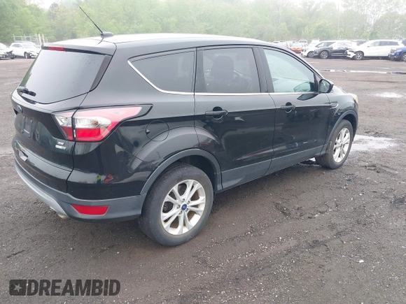 2017 Ford Escape SE with VIN 1FMCU9GD3HUD90154, listed as a IAAI auction lot 42181078 with 106,143 mi miles and . Bid and sale history available at DreamBid. Image 4.
