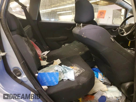 2010 Honda Fit Sport with VIN JHMGE8H42AC023154, listed as a Copart auction lot 42262615 with 104,928 mi miles and Salvage Title. Bid and sale history available at carsss.com. Image 10.