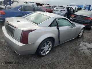 2004 Cadillac XLR z VIN 1G6YV34A545602056, wystawiony jako Copart lot #66506514 z przebiegiem Nie podano mil oraz Nie do naprawy. Historia ofert i sprzedaży dostępna na DreamBid. Obrazek 3.