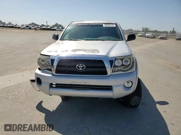 2007 Toyota Tacoma PreRunner z VIN 5TEJU62N37Z399808, wystawiony jako Copart lot #56256125 z przebiegiem 175 093 mil mil oraz Szkoda całkowita • Salvage title. Historia ofert i sprzedaży dostępna na DreamBid. Obrazek 14.