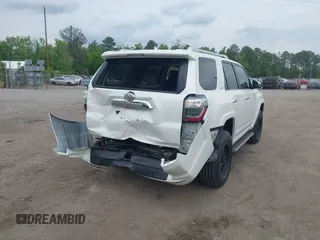 2014 Toyota 4Runner Limited with VIN JTEBU5JR4E5185764, listed as a IAAI auction lot 42117308 with 199,477 mi miles. Bid and sale history available at carsss.com. Image 4.