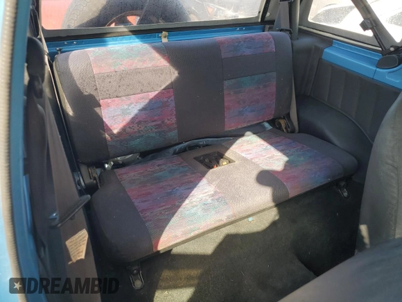 1994 Geo Tracker z VIN 2CNBE18U0R6940807, wystawiony jako Copart lot #78071244 z przebiegiem 116 472 mil mil oraz Nie do naprawy. Historia ofert i sprzedaży dostępna na DreamBid. Obrazek 10.