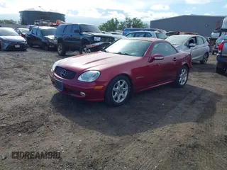 2001 Mercedes-Benz SLK-Class Kompressor with VIN WDBKK49F51F203464, listed as a IAAI auction lot 41807410 with 114,822 mi miles. Bid and sale history available at carsss.com. Image 2.