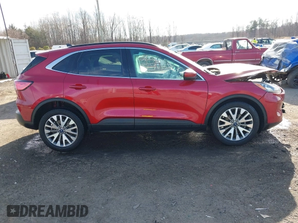 2021 Ford Escape Titanium with VIN 1FMCU9J9XMUA70800, listed as a IAAI auction lot 41717946 with Not Provided miles and . Bid and sale history available at carsss.com. Image 12.