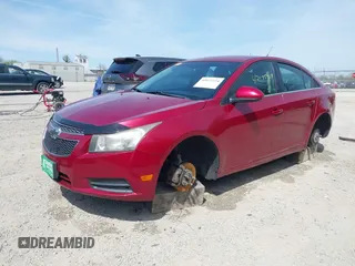 2014 Chevrolet Cruze 1LT with VIN 1G1PC5SB0E7440115, listed as a IAAI auction lot 42075724 with 115,813 mi miles and . Bid and sale history available at DreamBid. Image 2.