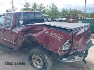 1998 Ford F-150 with VIN 1FTZX18W5WNC39962, listed as a IAAI auction lot 41951328 with 228,438 mi miles and . Bid and sale history available at DreamBid. Image 6.