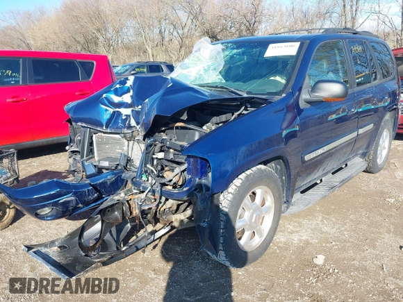 2003 GMC Envoy SLT with VIN 1GKDT13S732268164, listed as a IAAI auction lot 41863800 with 100,702 mi miles. Bid and sale history available at carsss.com. Image 2.