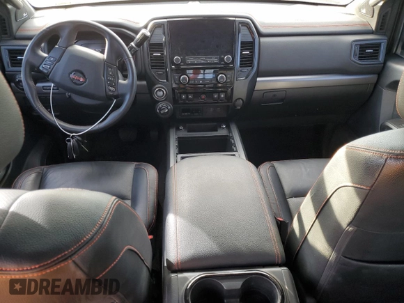 2021 Nissan Titan SV z VIN 1N6AA1FB9MN533034, wystawiony jako Copart lot #81335494 z przebiegiem 71 281 mil mil oraz Szkoda całkowita • Salvage title. Historia ofert i sprzedaży dostępna na DreamBid. Obrazek 8.