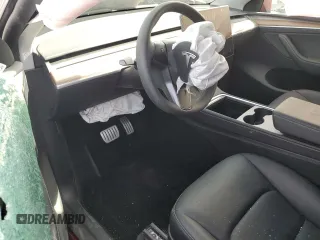 2024 Tesla Model Y Performance z VIN 7SAYGDEF7RF128112, wystawiony jako Copart lot #85596764 z przebiegiem Nie podano mil oraz Szkoda całkowita • Salvage title. Historia ofert i sprzedaży dostępna na DreamBid. Obrazek 8.