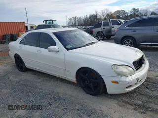 2003 Mercedes-Benz S-Class 4.3L with VIN WDBNG70J83A318268, listed as a IAAI auction lot 41380963 with 243,734 mi miles. Bid and sale history available at carsss.com. Image 1.
