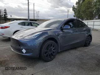 2021 Tesla Model Y Long Range with VIN 5YJYGDEE6MF200883, listed as a Copart auction lot 51707405 with 59,820 mi miles and Salvage Title. Bid and sale history available at DreamBid. Image 1.