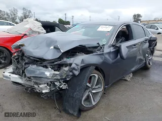 2018 Honda Accord Sedan Sport 1.5T with VIN 1HGCV1F39JA219221, listed as a IAAI auction lot 38668666 with 140,482 mi miles. Bid and sale history available at carsss.com. Image 17.