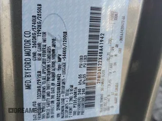2004 Ford Freestar SEL z VIN 2FMDA522X4BA41942, wystawiony jako Copart lot #54007555 z przebiegiem 119 877 mil mil oraz Szkoda całkowita • Salvage title. Historia ofert i sprzedaży dostępna na DreamBid. Obrazek 13.