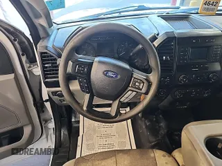 2019 Ford F-150 XL with VIN 1FTEX1E55KKC02870, listed as a IAAI auction lot 42631387 with 206,967 mi miles and . Bid and sale history available at DreamBid. Image 37.