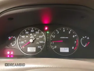 2002 Nissan Maxima GLE z VIN JN1DA31AX2T305310, wystawiony jako IAAI lot #42302521 z przebiegiem 68 920 mil mil oraz . Historia ofert i sprzedaży dostępna na DreamBid. Obrazek 7.