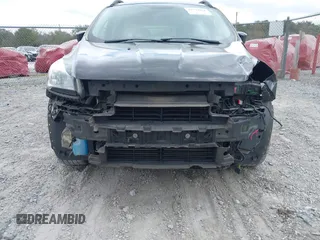 2016 Ford Escape SE z VIN 1FMCU0GX7GUC39581, wystawiony jako IAAI lot #41723962 z przebiegiem 102 568 mil mil oraz . Historia ofert i sprzedaży dostępna na DreamBid. Obrazek 6.