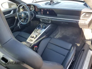 2021 Porsche 911 Turbo S with VIN WP0AD2A94MS258095, listed as a Copart auction lot 43157565 with 1,513 mi miles and Salvage Title. Bid and sale history available at DreamBid. Image 8.