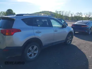 2013 Toyota RAV4 XLE with VIN JTMRFREV9DD013682, listed as a IAAI auction lot 42142414 with 202,680 mi miles. Bid and sale history available at carsss.com. Image 4.
