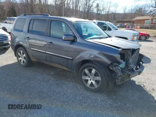 2014 Honda Pilot Touring with VIN 5FNYF4H95EB019048, listed as a IAAI auction lot 41526958 with 172,252 mi miles and . Bid and sale history available at carsss.com. Image 1.