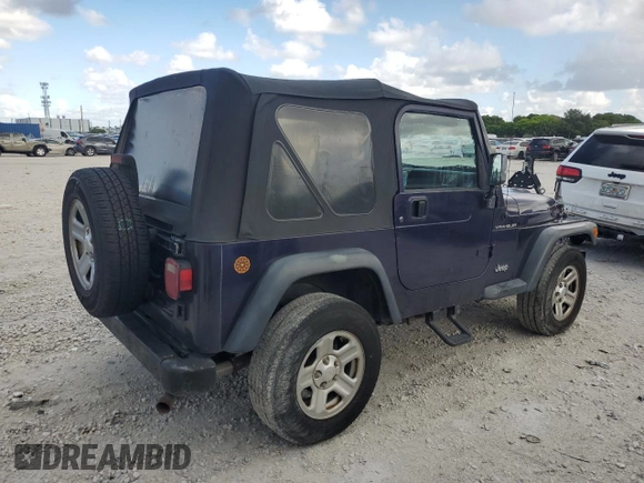 1998 Jeep Wrangler SE with VIN 1J4FY29P6WP705491, listed as a Copart auction lot 61873695 with 195,678 mi miles and Clean title. Bid and sale history available at DreamBid. Image 3.