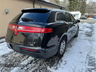 2019 Lincoln MKT with VIN 2LMHJ5NK1KBL00882, listed as a Copart auction lot 44974075 with 256,091 mi miles and Clean Title. Bid and sale history available at DreamBid. Image 4.