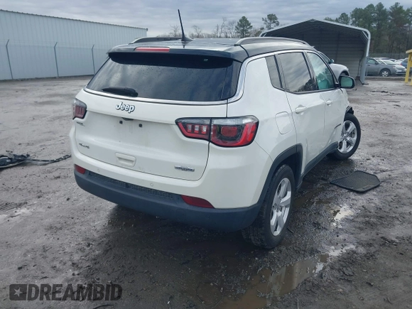 2019 Jeep Compass Latitude with VIN 3C4NJDBB1KT761196, listed as a IAAI auction lot 41812230 with 51,268 mi miles. Bid and sale history available at carsss.com. Image 4.