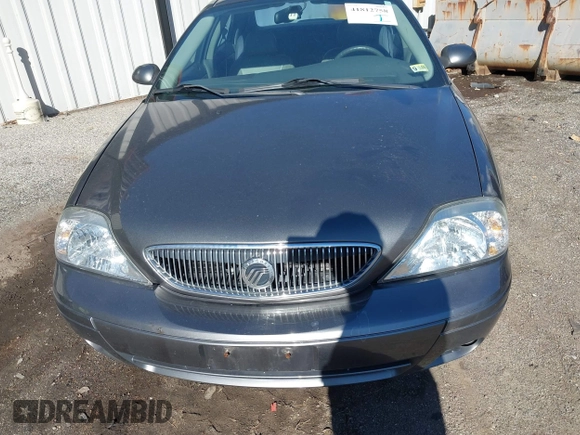 2004 Mercury Sable LS Premium z VIN 1MEHM55S54G607845, wystawiony jako IAAI lot #41812758 z przebiegiem 200 883 mil mil oraz . Historia ofert i sprzedaży dostępna na DreamBid. Obrazek 6.