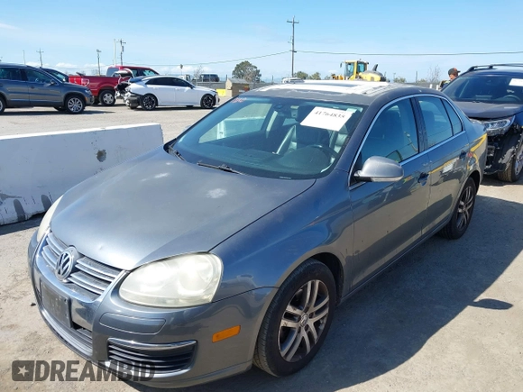 2005 Volkswagen Jetta z VIN 3VWDG71K35M613236, wystawiony jako IAAI lot #41764835 z przebiegiem Nie podano mil oraz . Historia ofert i sprzedaży dostępna na DreamBid. Obrazek 6.